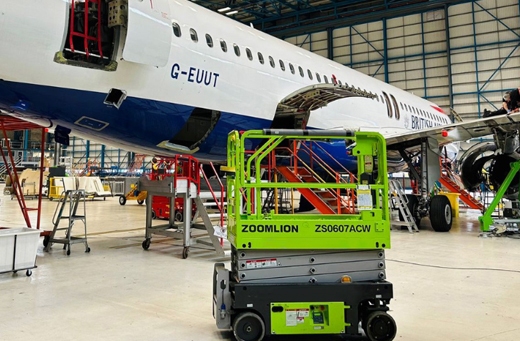 ZS0607ACW electric scissor lift working at airport in UK